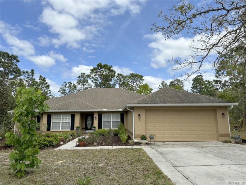 Welcome to this charming 4-bedroom home nestled within the - Beach Home for sale in Homosassa, Florida on Beachhouse.com