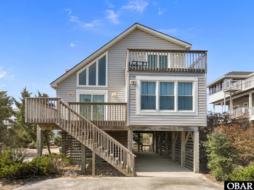 Welcome to 25304 Sea Isle Hills Dr in Waves, NC, a beautiful and - Beach Home for sale in Waves, North Carolina on Beachhouse.com