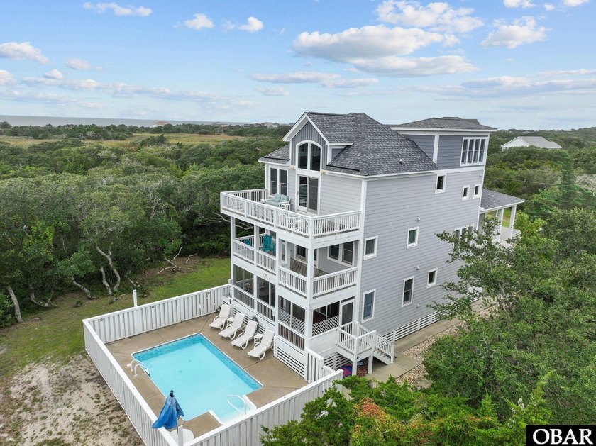 This 6-bedroom, 4.5 bath retreat in the heart of Avon's - Beach Home for sale in Avon, North Carolina on Beachhouse.com