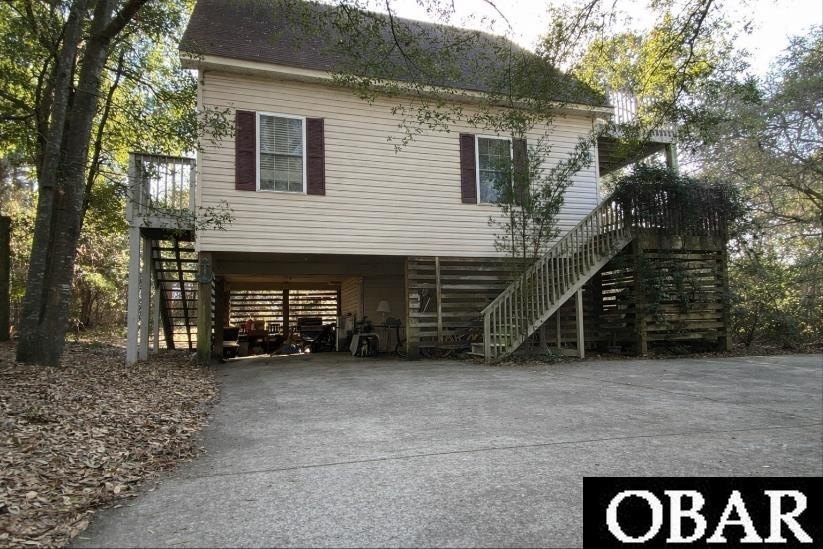 Tucked away on a quiet cul-de-sac in the gated waterfront - Beach Home for sale in Kill Devil Hills, North Carolina on Beachhouse.com