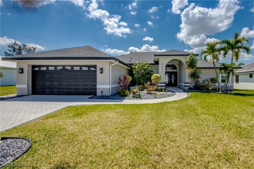 WELCOME TO FLORIDA! . . . This stunning 4-bedroom, 2.5-bath pool - Beach Home for sale in Cape Coral, Florida on Beachhouse.com