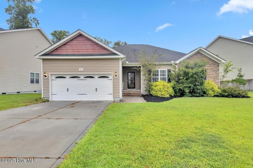 Welcome to this beautifully maintained 4-bed, 2-bath home in the - Beach Home for sale in Sneads Ferry, North Carolina on Beachhouse.com