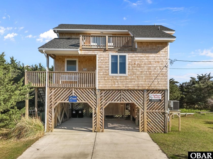 FROG HOLLOW - Immediately feel the warmth of this drop-dead - Beach Home for sale in Avon, North Carolina on Beachhouse.com
