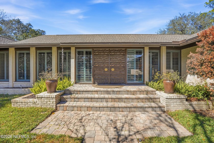 Vaulted ceilings and sunlit interiors define this elegant - Beach Home for sale in Jacksonville, Florida on Beachhouse.com