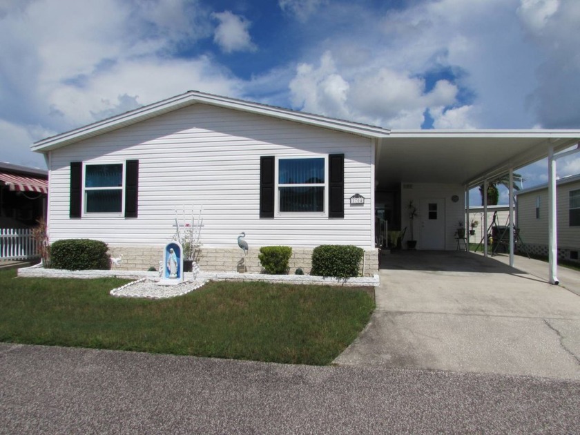 BEAUTIFUL 3 BEDROOM 2 BATH FURNISHED JACOBSEN   The living room - Beach Home for sale in Trinity, Florida on Beachhouse.com