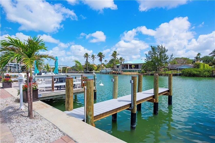 Experience the charm of Palm Bay Villas, a beautiful and bright - Beach Condo for sale in Naples, Florida on Beachhouse.com
