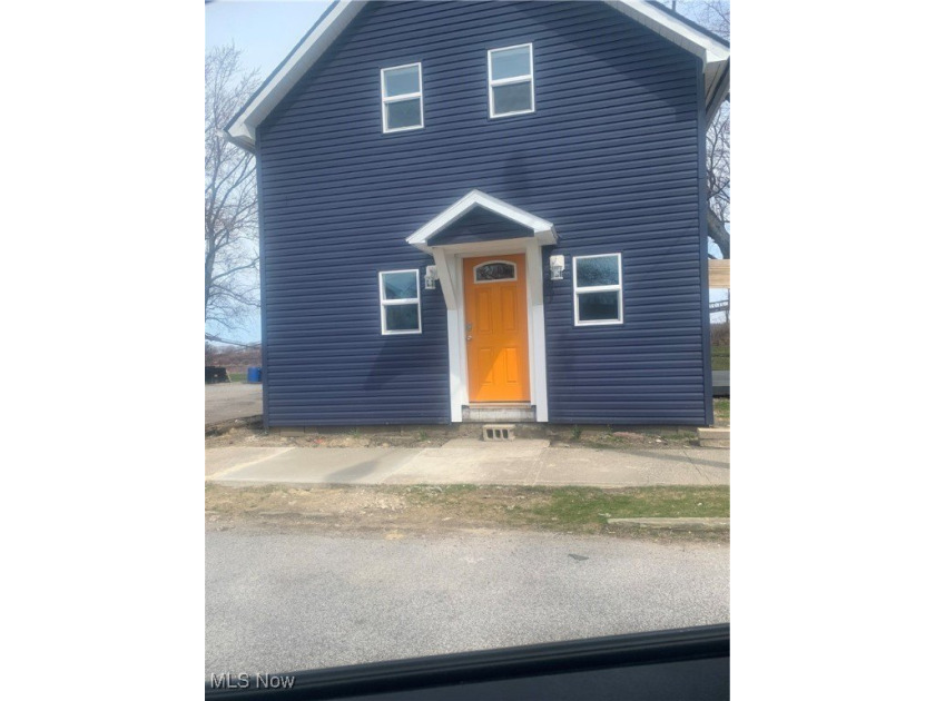 Must See! Located in the heart of Conneaut Harbor, this home is - Beach Home for sale in Conneaut, Ohio on Beachhouse.com