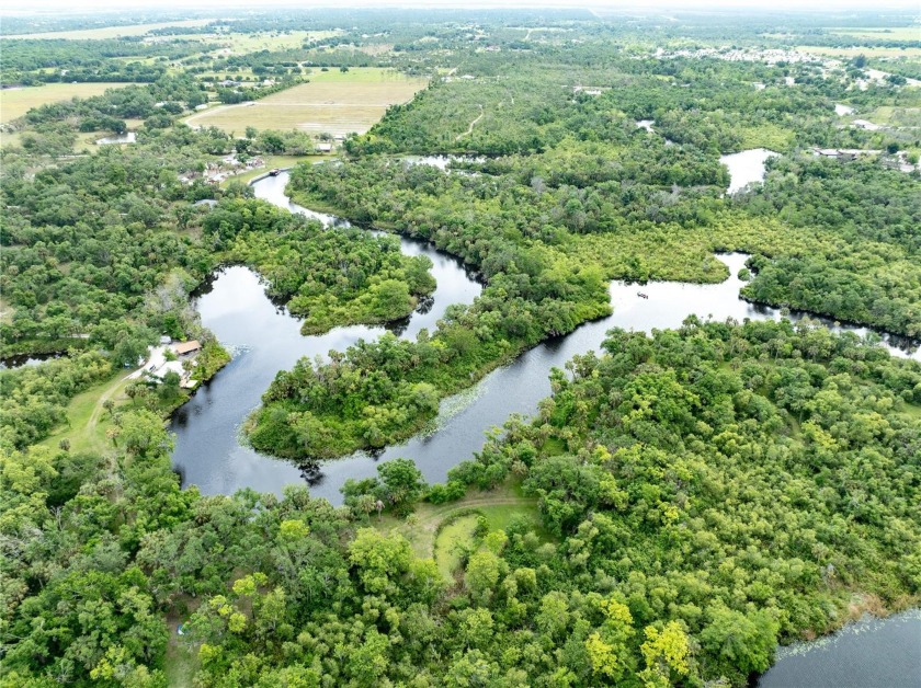 This is an amazing 12 + acres of a tropical OASIS with water - Beach Acreage for sale in Punta Gorda, Florida on Beachhouse.com