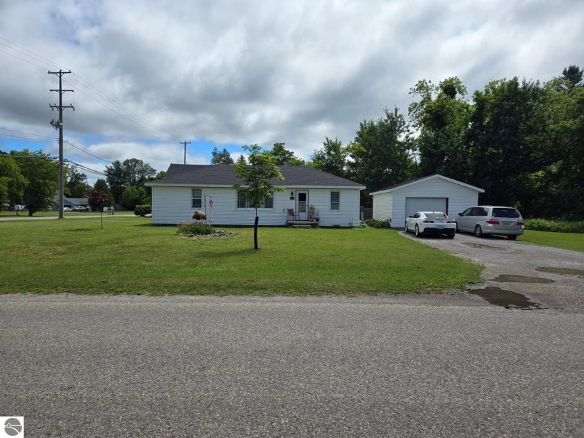 Cute three-bedroom one bath home sitting on a large corner lot - Beach Home for sale in Tawas City, Michigan on Beachhouse.com