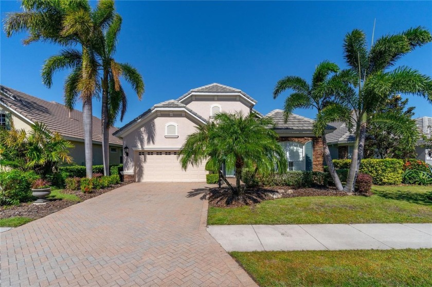 Behind the gates of pristine Lakewood Ranch Golf and Country - Beach Home for sale in Bradenton, Florida on Beachhouse.com