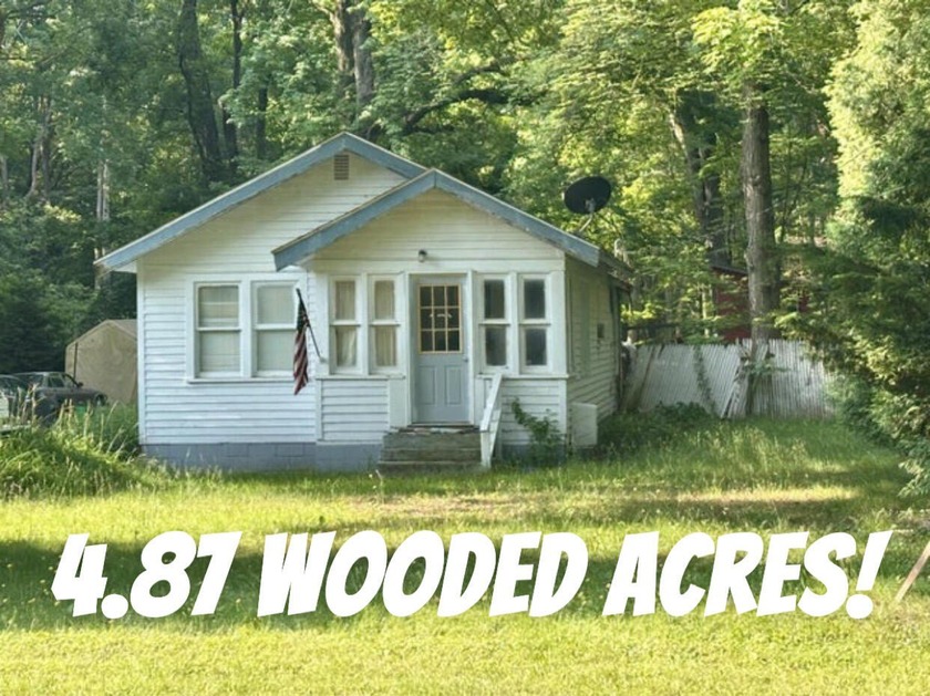 Diamond in the Rough with Endless Potential! Rare opportunity to - Beach Home for sale in Norton Shores, Michigan on Beachhouse.com