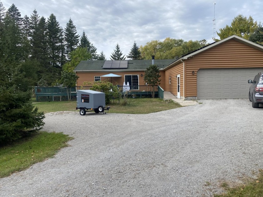 Beautiful home that features the perfect get away right on Black - Beach Home for sale in Black River, Michigan on Beachhouse.com