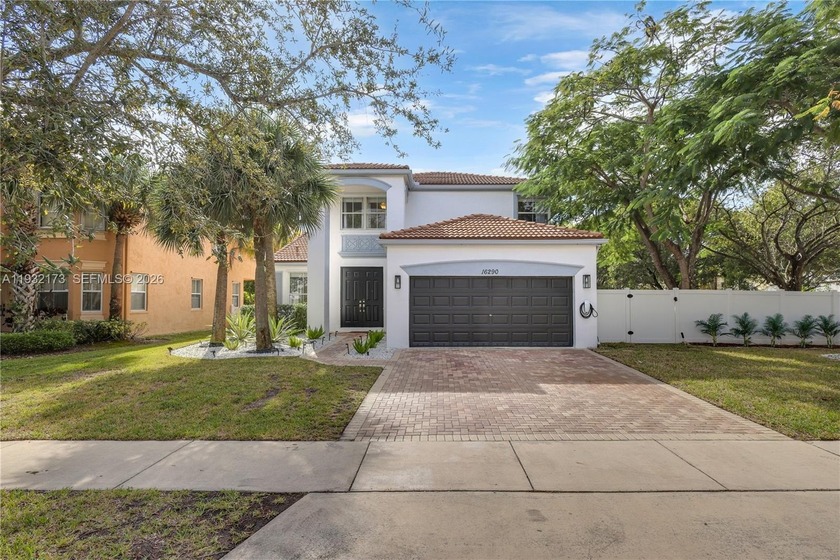 This spacious 4-bedroom, 3-bath home is located in the - Beach Home for sale in Miramar, Florida on Beachhouse.com