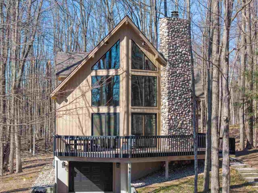 The Black and Tan Chalet, nestled in one of Northern Michigan's - Beach Home for sale in Harbor Springs, Michigan on Beachhouse.com