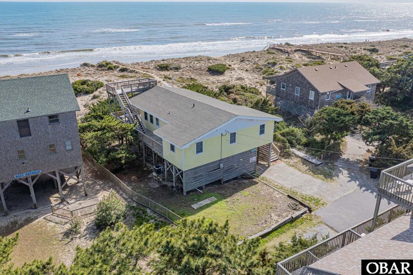 Welcome to Laughing Gull, a classic oceanfront escape tucked - Beach Home for sale in Hatteras Island, North Carolina on Beachhouse.com