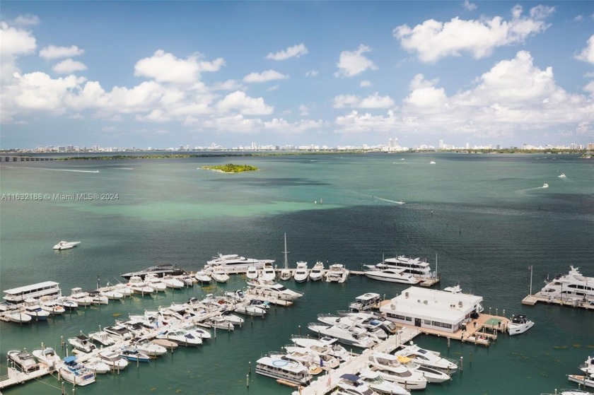 This exquisite corner unit features beautifully updated - Beach Condo for sale in Miami, Florida on Beachhouse.com