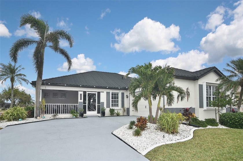 When you step through the front door of this beautiful home, the - Beach Home for sale in Punta Gorda, Florida on Beachhouse.com