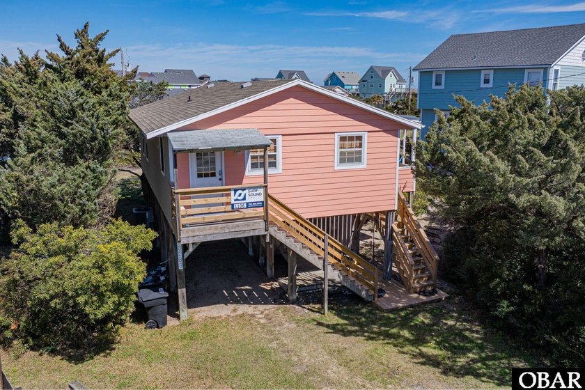 Steps from the sand and full of coastal charm, this classic Avon - Beach Home for sale in Avon, North Carolina on Beachhouse.com