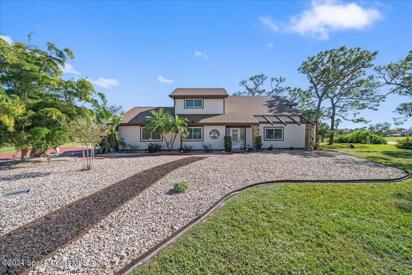 Welcome to this stunning 4-bedroom, 2.5-bathroom home, offering - Beach Home for sale in Melbourne, Florida on Beachhouse.com