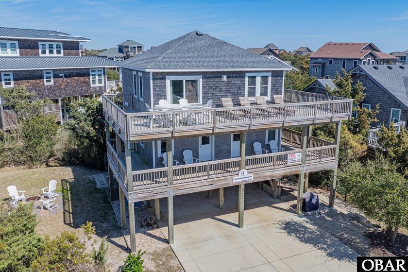 Perfectly situated on the oceanside of Frisco, Coastal Quest is - Beach Home for sale in Frisco, North Carolina on Beachhouse.com