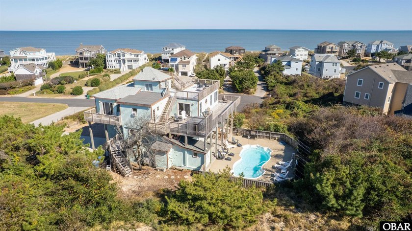 Set high above the surrounding landscape on a rare corner - Beach Home for sale in Duck, North Carolina on Beachhouse.com