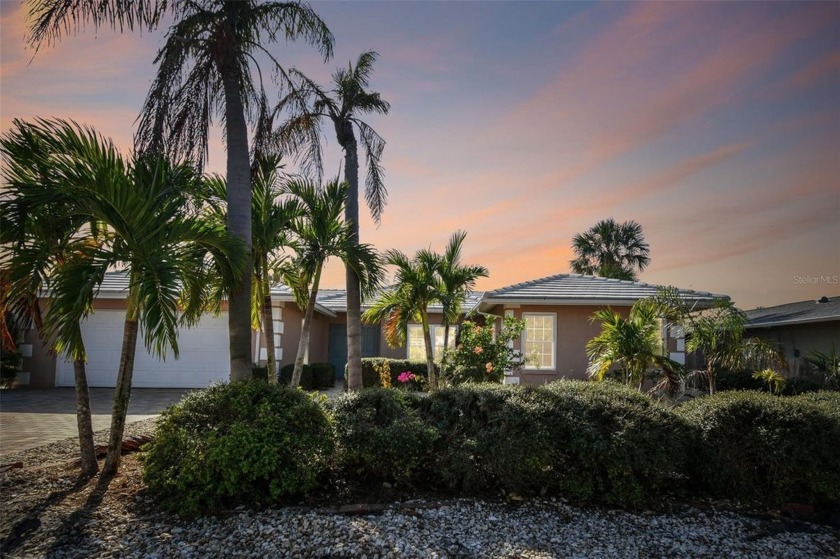 This three bedroom three bath pool/canal front home is located - Beach Home for sale in Sarasota, Florida on Beachhouse.com