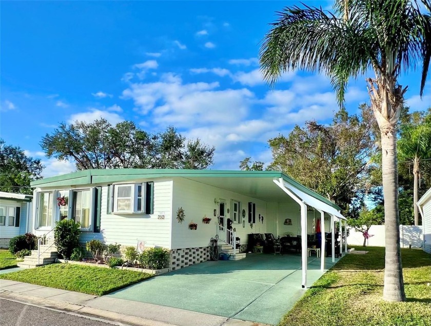 This beautifully maintained 2-bedroom, 2-bathroom home offers - Beach Home for sale in Largo, Florida on Beachhouse.com