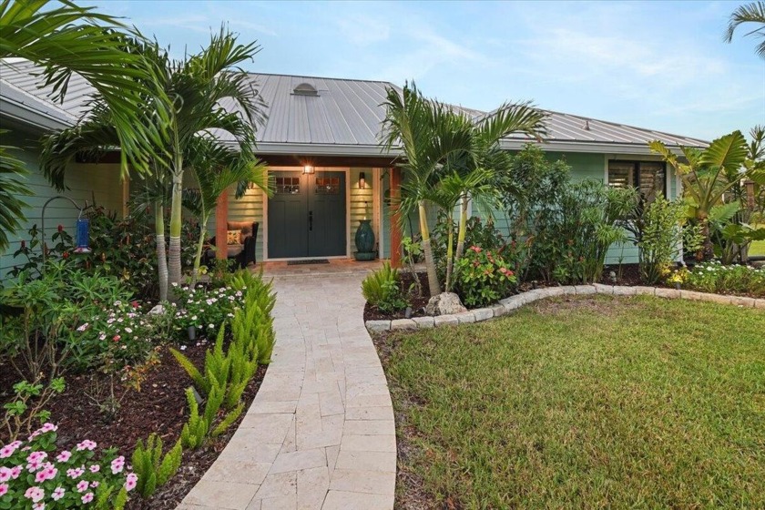 Your oasis awaits! This beautifully landscaped & open concept - Beach Home for sale in Palm City, Florida on Beachhouse.com