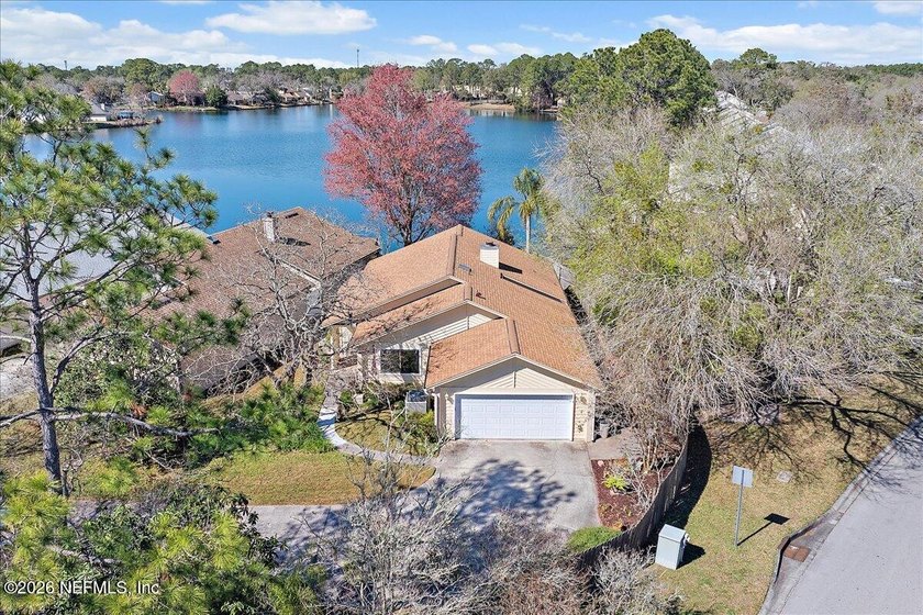 Welcome home to this beautifully maintained 0.42-acre lakefront - Beach Home for sale in Jacksonville, Florida on Beachhouse.com