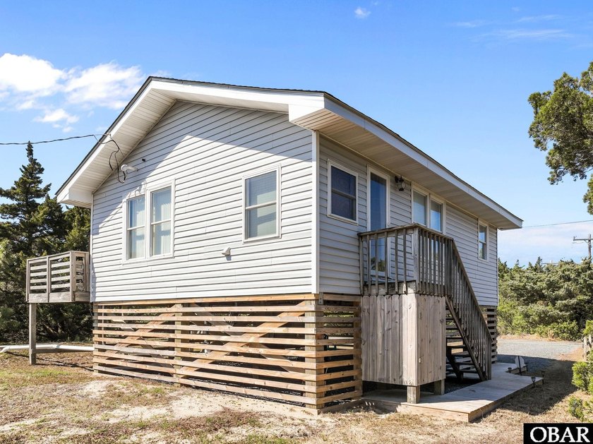 Experience effortless waterfront living in this adorable - Beach Home for sale in Avon, North Carolina on Beachhouse.com