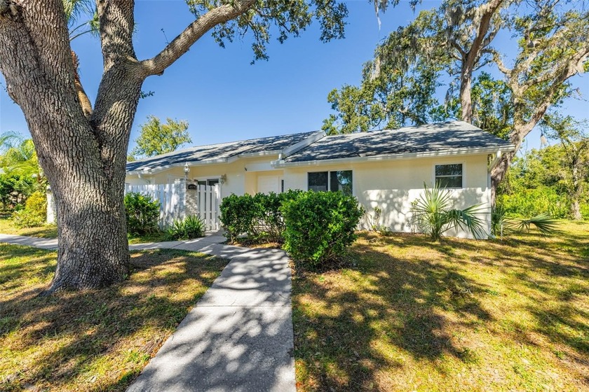 Welcome to Strathmore Gate-West, a peaceful, pet-friendly - Beach Home for sale in Palm Harbor, Florida on Beachhouse.com