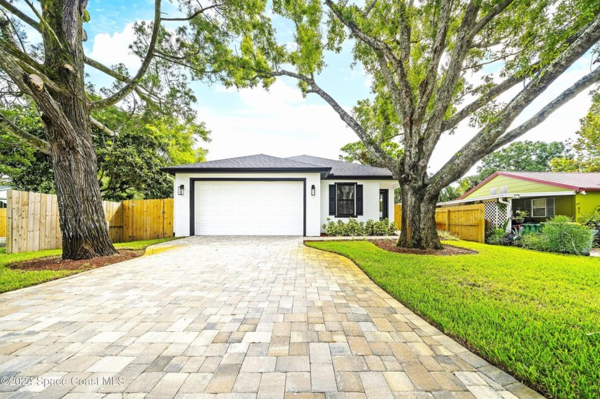 Discover modern luxury in this stunning brand-new single-story - Beach Home for sale in Melbourne, Florida on Beachhouse.com