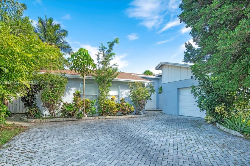 Beautiful updated pool home with 3 bedrooms, 2 baths with 1 car - Beach Home for sale in Deerfield Beach, Florida on Beachhouse.com