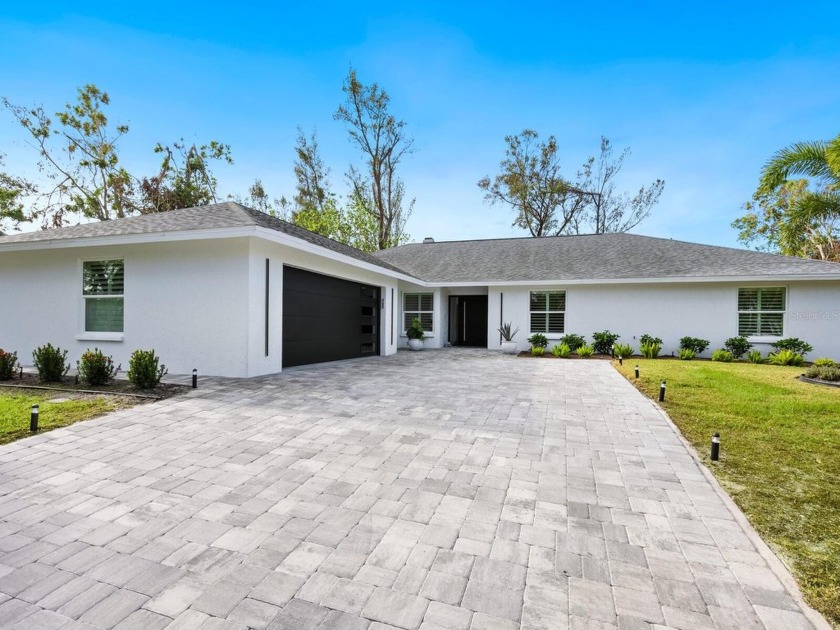 A tropical outdoor oasis. No flood or hurricane damage - Beach Home for sale in Sarasota, Florida on Beachhouse.com