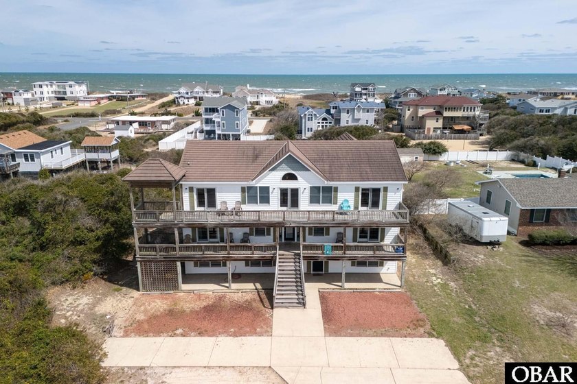 Situated just two lots off the ocean in Southern Shores, this - Beach Home for sale in Southern Shores, North Carolina on Beachhouse.com