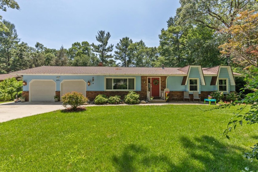 Fantastic 4 bed, 3 bath walkout ranch in a the perfect location - Beach Home for sale in Muskegon, Michigan on Beachhouse.com
