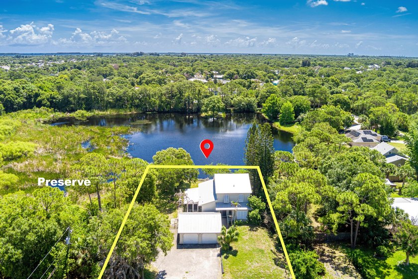 Rare lakefront sanctuary with endless possibilities! Own this - Beach Home for sale in Fort Pierce, Florida on Beachhouse.com