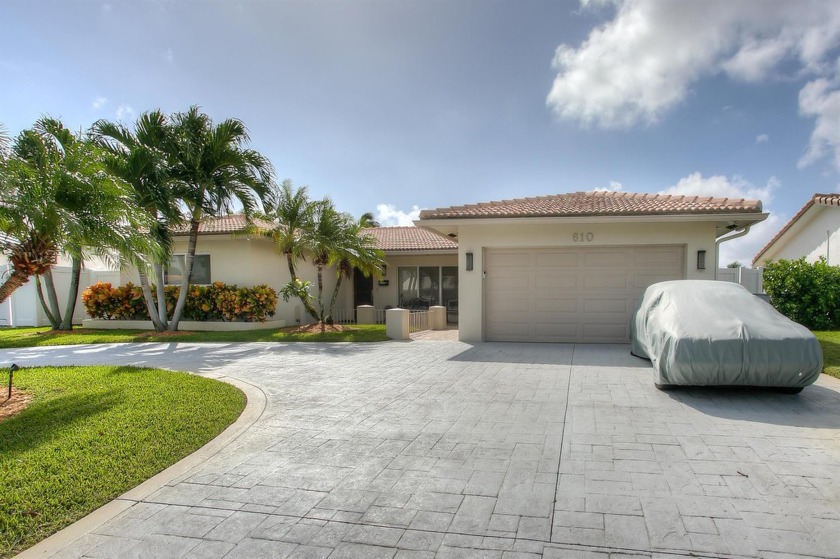 Welcome to this stunning 4-bedroom, 3-bath oasis with - Beach Home for sale in Pompano Beach, Florida on Beachhouse.com