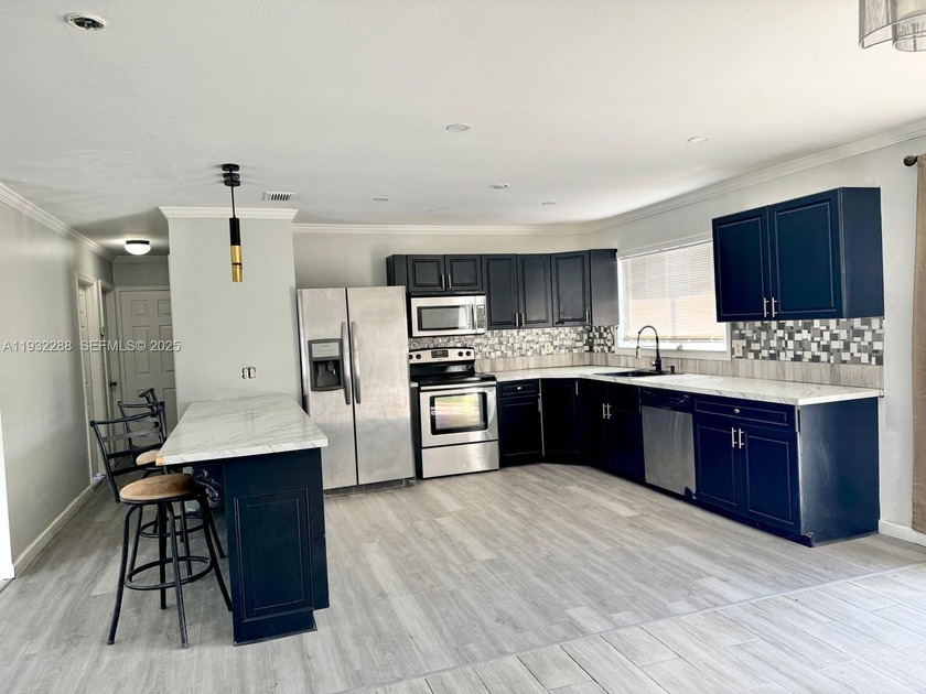 This beautifully updated 3-bedroom, 2-bathroom home is truly - Beach Home for sale in Port Saint Lucie, Florida on Beachhouse.com