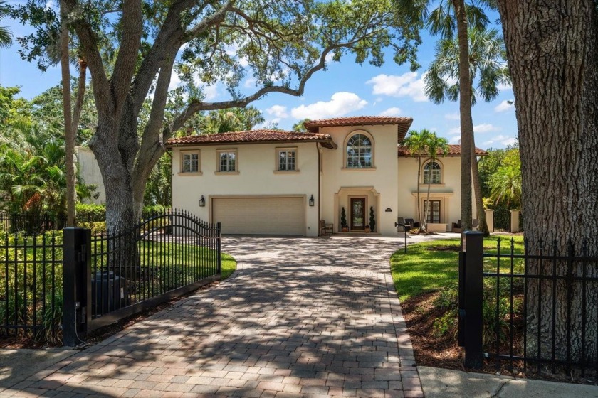 This stately pool home is set back on an 80x181 lot on a - Beach Home for sale in Tampa, Florida on Beachhouse.com