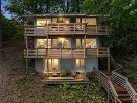 A secluded retreat on one of Lake Michigan's finest sugar-sand - Beach Home for sale in Muskegon, Michigan on Beachhouse.com