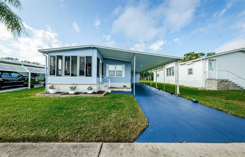 Welcome to this beautifully updated, move-in ready, and fully - Beach Home for sale in Tarpon Springs, Florida on Beachhouse.com