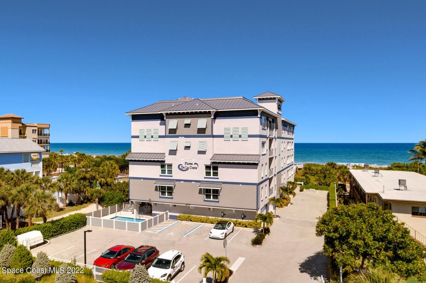 Come visit this modern fully-furnished four bedroom three bath - Beach Condo for sale in Cocoa Beach, Florida on Beachhouse.com