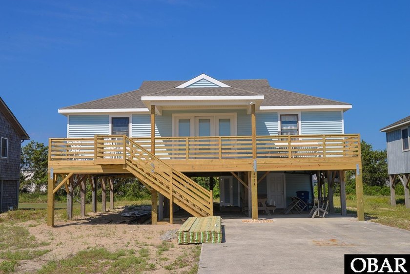 This classic Nags Head beach home is ideally located just one - Beach Home for sale in Nags Head, North Carolina on Beachhouse.com