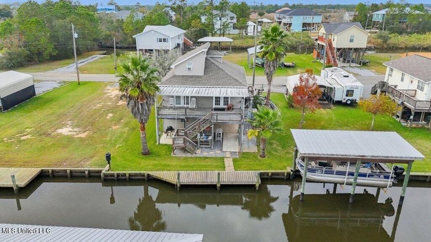 Waterfront living at its best! This well-maintained, fully - Beach Home for sale in Bay Saint Louis, Mississippi on Beachhouse.com
