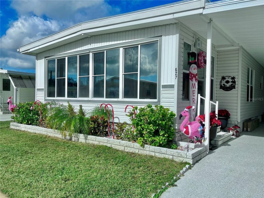 This exceptional home will captivate you from the moment you - Beach Home for sale in Largo, Florida on Beachhouse.com