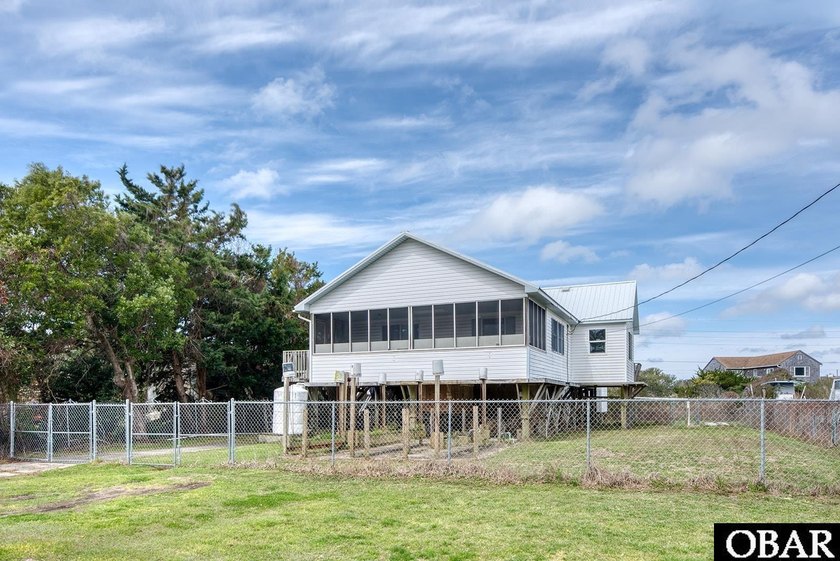 Nestled in the quiet Rogues Retreat, 52114 Gondyke Way is a - Beach Home for sale in Frisco, North Carolina on Beachhouse.com