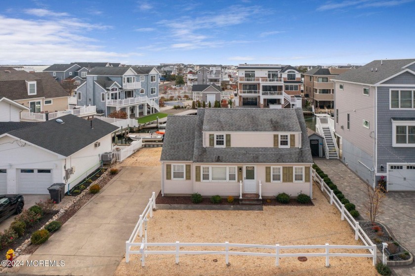 Embrace lagoon living with this waterfront property boasting 60 - Beach Home for sale in Beach Haven West, New Jersey on Beachhouse.com