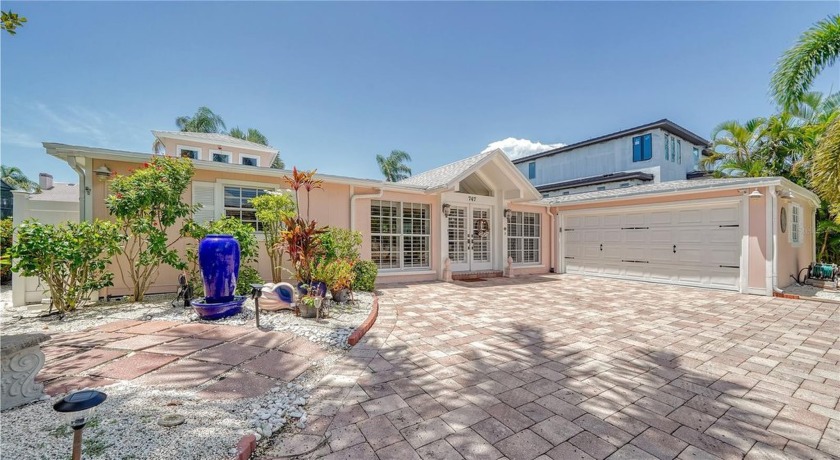 This waterfront retreat is nestled in the sought-after community - Beach Home for sale in Longboat Key, Florida on Beachhouse.com