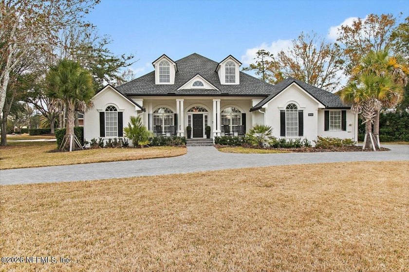 Located on an oversized corner lot in Marsh Landing, this - Beach Home for sale in Ponte Vedra Beach, Florida on Beachhouse.com